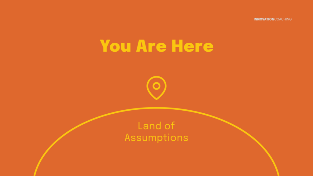 orange background showing pin that points to "Land of Assumptions"