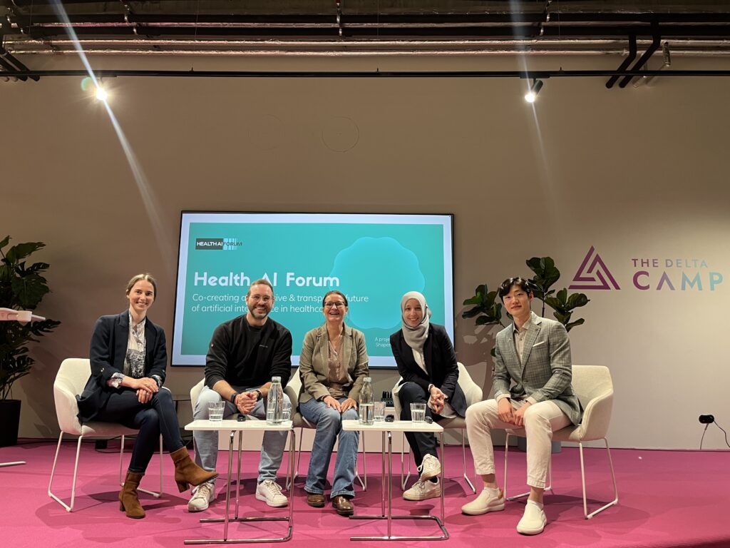 Nicola with panelists at Health AI Forum event